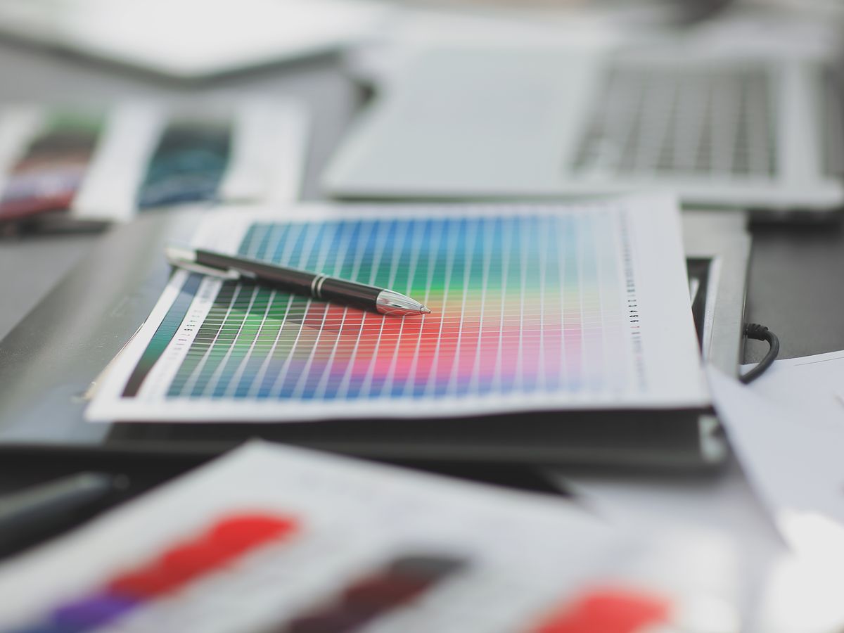 Print colour proofs and swatches on a designer's desk